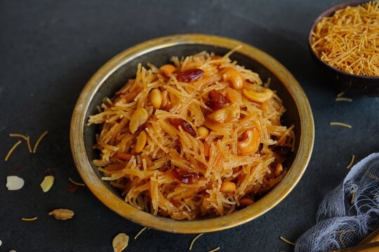 Semiya or Vermicelli kesari topped with nuts and raisins- Indian deseerts