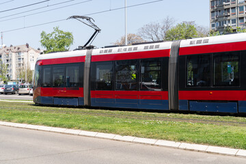 Modern tram on the city street.
