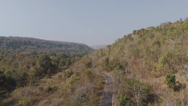 Drone shot scenic landscape Aerial view of a deserted local road