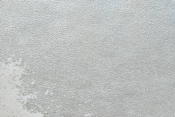 Distressed silver gray fine leather texture pattern as background