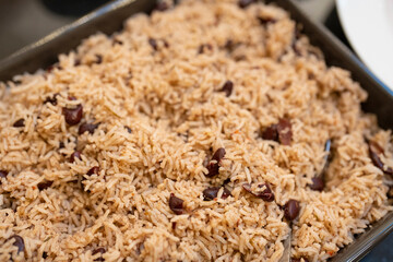 Rice and black beans in pan