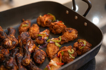 Fried meat in pan