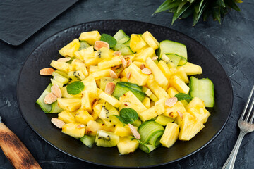 Vegetarian pineapple and cucumber salad.