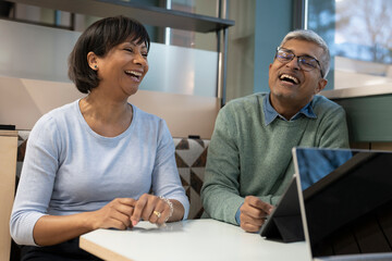 Smiling business people working in office