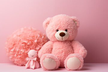 Soft peach fuzz teddy bear with a round-shaped pillow. Tender love concept