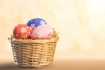Collection of the beautiful colored easter eggs in the basket