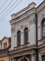 Facade of a house in the old town. Old architecture of Vilnius
