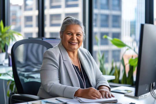 senior indigenous business woman portrait in modern office, diversity 