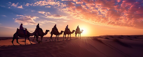 Desert landscape at sunset on a sunny afternoon with camels running