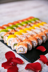 Assorted tasty japanese sushi rolls on a plate. st. Valentine concept