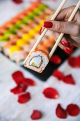 Assorted tasty japanese sushi rolls on a plate. st. Valentine concept