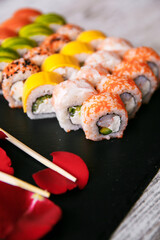 Assorted tasty japanese sushi rolls on a plate. st. Valentine concept
