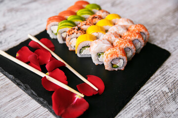 Assorted tasty japanese sushi rolls on a plate. st. Valentine concept