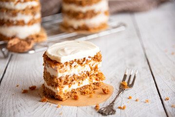 Small carrot cakes on white background