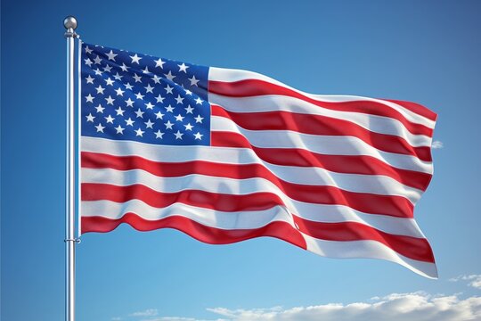 Waving American flag in the blue sky