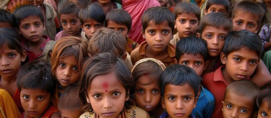 The camera captures the gaze of destitute children, conveying their hardship and vulnerability.