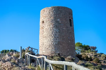 Papier Peint photo Cerro Torre Mediterranean coastal landscape. Historic Torre Vigia De Cerro Gordo, a watchtower looking out for any marauding pirates. La Herradura, Andulasia, Southern Spain