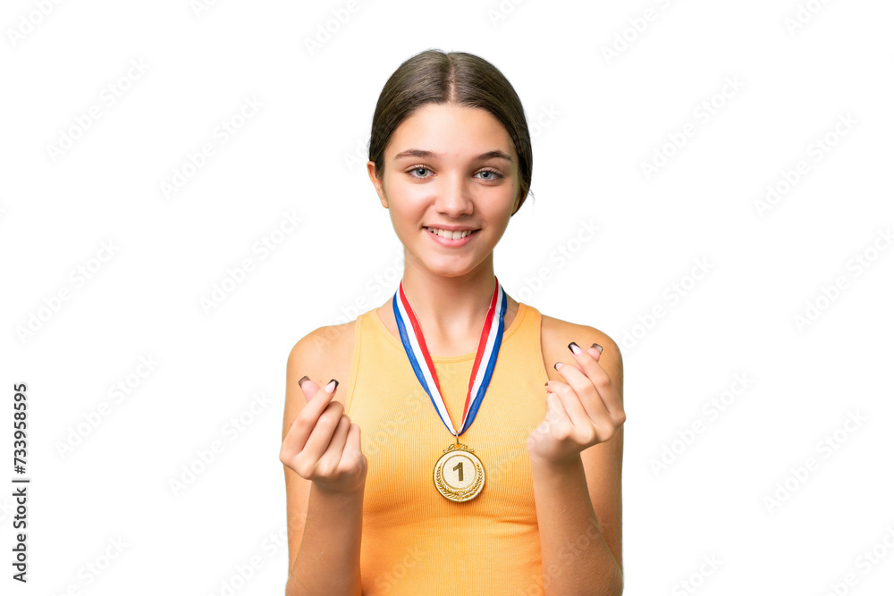 Sticker Teenager caucasian girl with medals over isolated background making money gesture