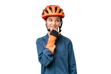 Teenager cyclist girl over isolated chroma key background looking to the side - obrazy, fototapety, plakaty