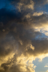 Fototapeta na wymiar Cumulus Clouds and Rain Above Hawaii. at Sunrise.