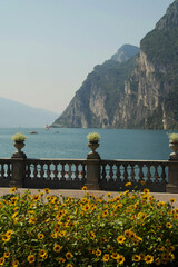 View of Lake Garda with beautiful flowers, Riva del Garda, Italy