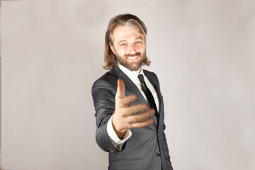 Businessman extending hand