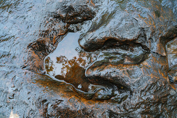 Large, carnivorous dinosaur footprints It was intricately carved into the stone. Refers to a long past era when gigantic creatures roamed the wasteland. Leaving a formidable mark behind.