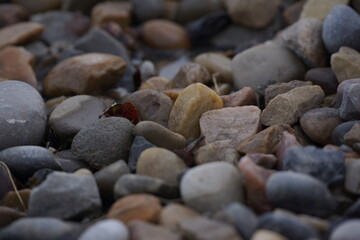 Macro of pile of multicoloured pebbles