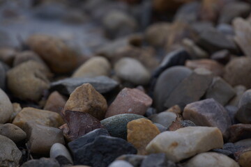 Macro of pile of multicoloured pebbles
