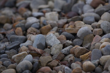 Macro of pile of multicoloured pebbles