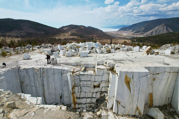 Abandoned Marble Quarry with view of lake Baikal in the village of Buguldeika from air.