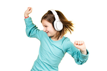 Child dancing while listening music on headphones.