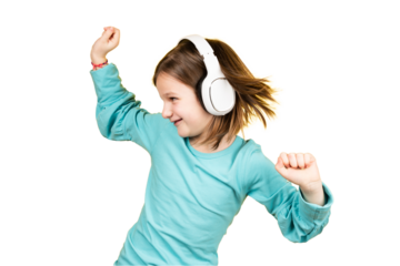 Child dancing while listening music on headphones.