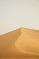 Crescent Moon Spring in Mingsha Mountain, Dunhuang City, Gansu Province - Desert scenery under a clear sky