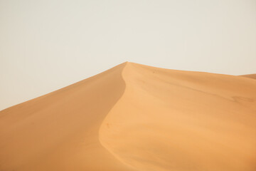 Crescent Moon Spring in Mingsha Mountain, Dunhuang City, Gansu Province - Desert scenery under a clear sky