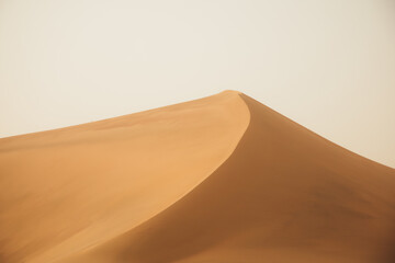 Crescent Moon Spring in Mingsha Mountain, Dunhuang City, Gansu Province - Desert scenery under a clear sky