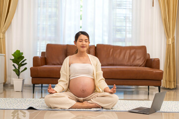 Happy smiling mother woman pregnancy with baby in belly, woman pregnant, birth, preparation, maternity, training relax and practicing yoga, fitness, exercise, wellness, workout, sport at home