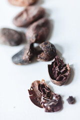 Closeup cocoa roasted beans. Shallow dof