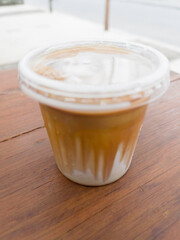 Dirty coffee cup or espresso coffee with milk