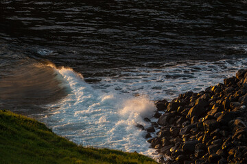 Ocean waves crashing on rocks