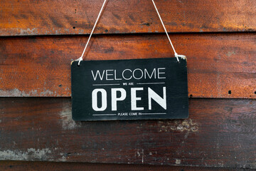 welcome open wooden sign background