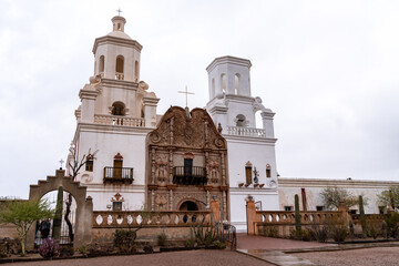 San Xavier del Bac Mission, Tohono O'odham Reservation, Tucson in Pima County, Arizona, on a cloudy day
