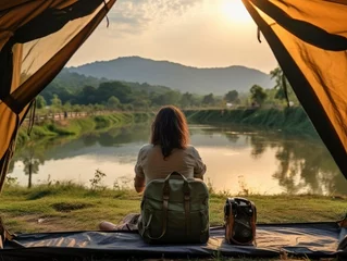 Fototapeten Asian woman travel and camping alone at natural park © kanesuan