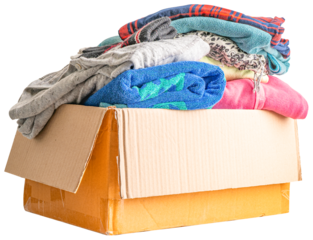 Donation box with used clothes isolated on white background with clipping path to support help for poor people in the world.
