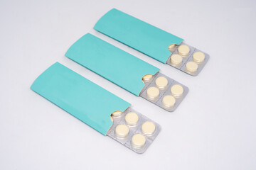 tablet medicine for pain on a white background