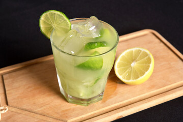 lemon drink, brazilian caipirinha refreshing and alcoholic citrus fruit drink