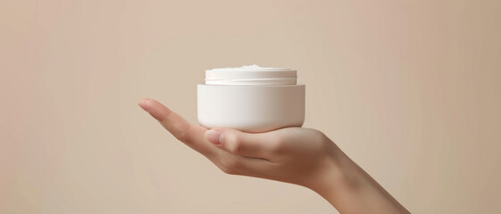 Fototapeta na wymiar Hand presenting a jar of cream, the essence of skincare and self-care