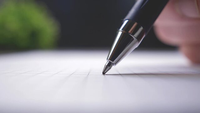 Fear of signing a document. Ballpoint pen close up