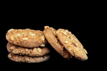 Closeup of Peanut Cookies or Biscuit Isolate on Black Background with Copy Space