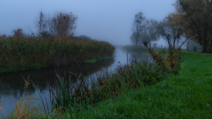 Morning fog on an autumn,morning on the boulevard on the Suprasl River in Podlasie.